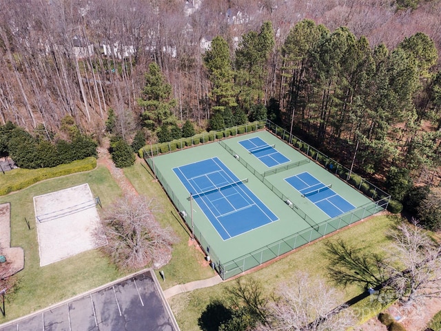 aerial view featuring a wooded view