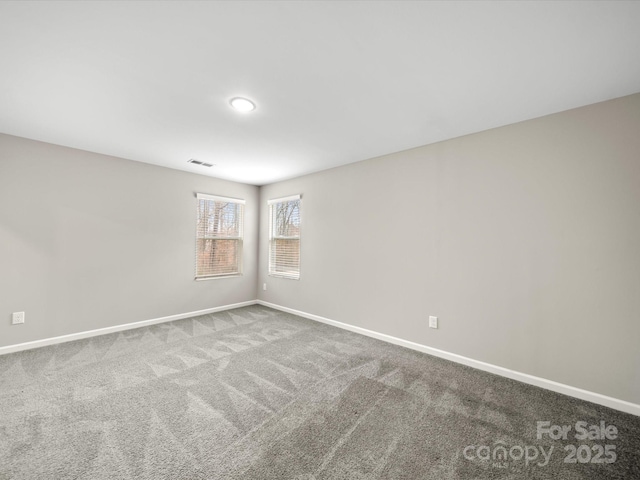 view of carpeted spare room