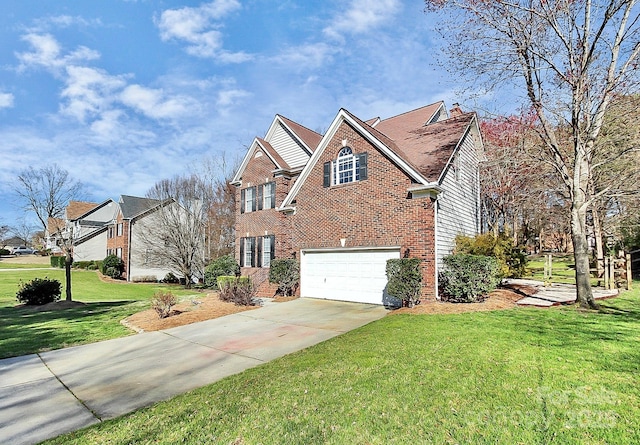 view of front of home featuring a garage and a front lawn