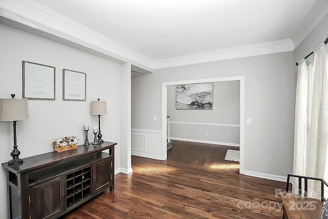 hall featuring crown molding and dark hardwood / wood-style flooring