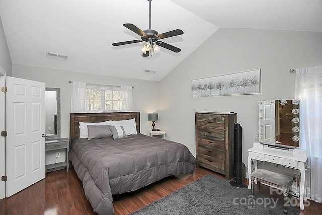 bedroom featuring ceiling fan, lofted ceiling, and dark hardwood / wood-style flooring