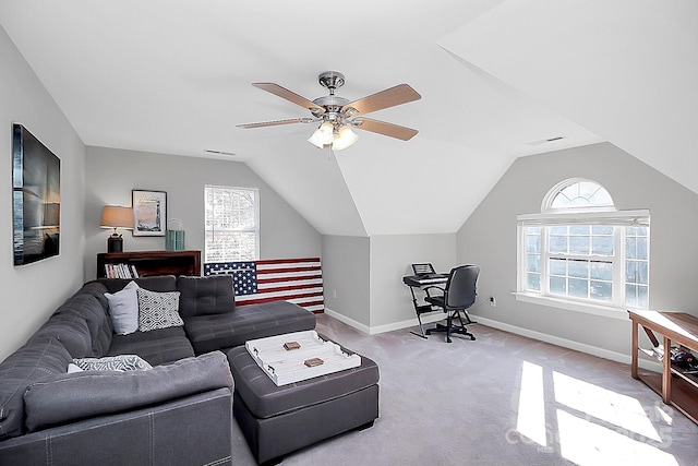 carpeted living room featuring vaulted ceiling and ceiling fan