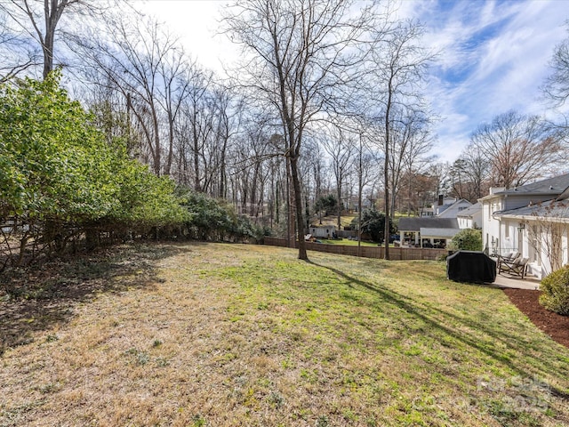 view of yard with fence