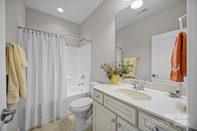 bathroom featuring visible vents, toilet, tile patterned floors, shower / bath combination with curtain, and vanity