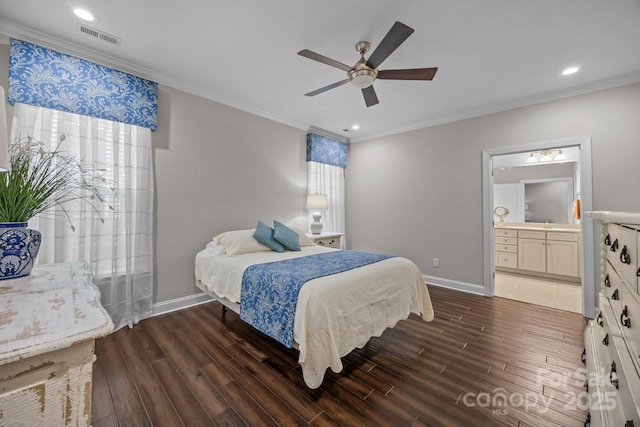 bedroom with dark wood-style floors, ornamental molding, and baseboards