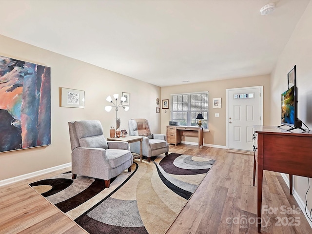 living room with light hardwood / wood-style flooring