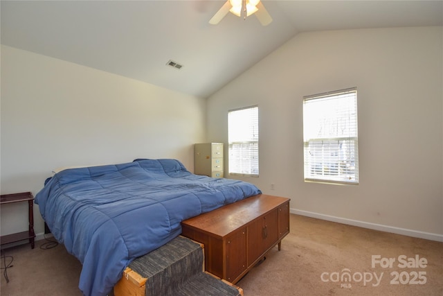 bedroom with light colored carpet, visible vents, vaulted ceiling, ceiling fan, and baseboards