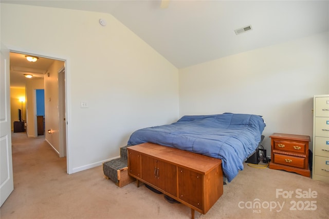 bedroom featuring lofted ceiling, light colored carpet, a ceiling fan, baseboards, and visible vents