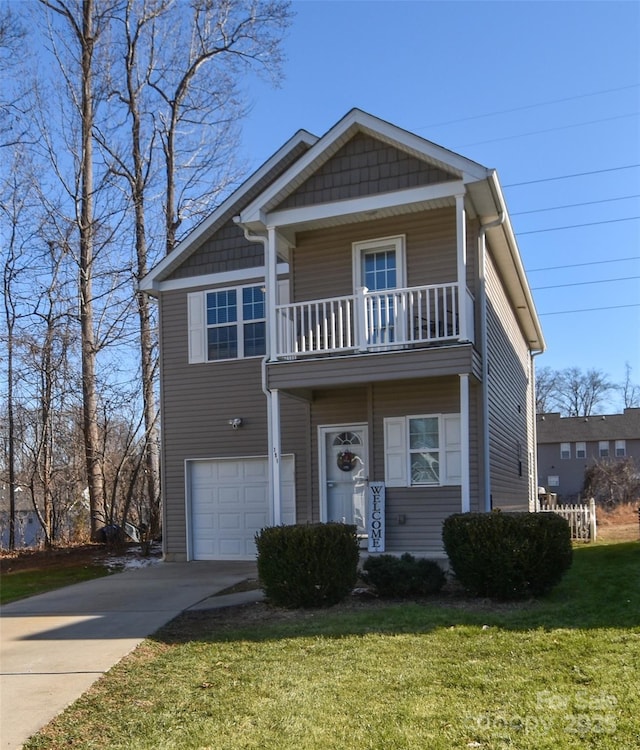 view of front of house with a garage, concrete driveway, a front lawn, and a balcony