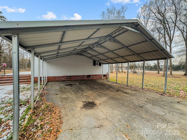 view of vehicle parking featuring a carport