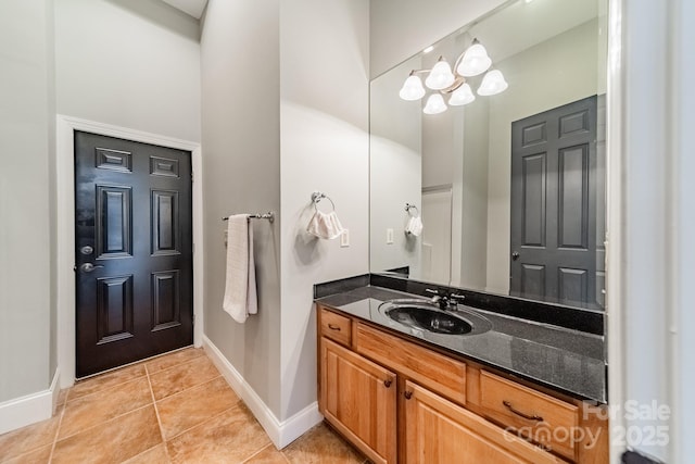 bathroom with vanity and tile patterned floors