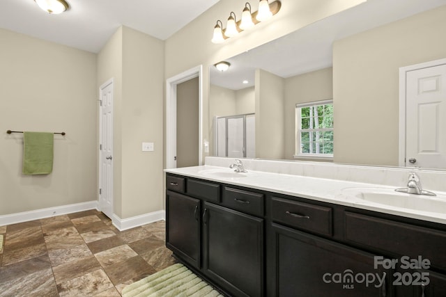 bathroom with vanity and walk in shower