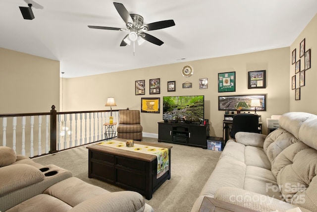 carpeted living room featuring ceiling fan