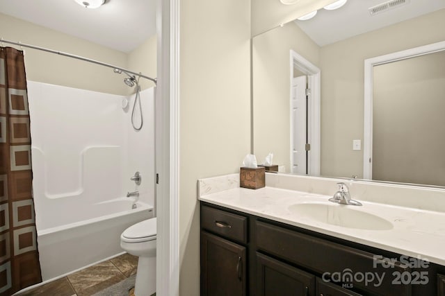 full bathroom with shower / bathtub combination with curtain, vanity, and toilet