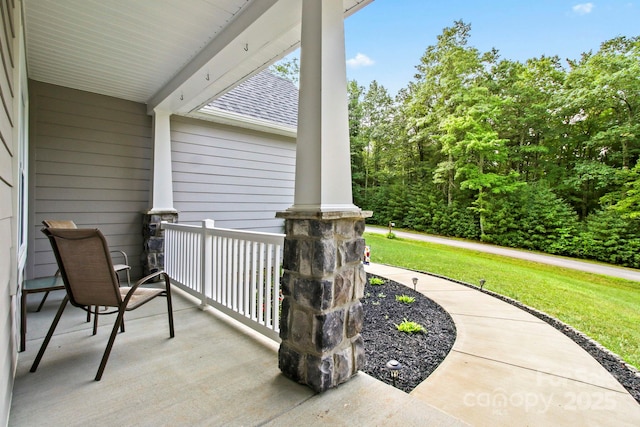 view of patio featuring a porch