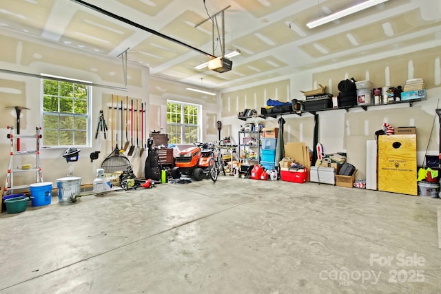 garage featuring a garage door opener