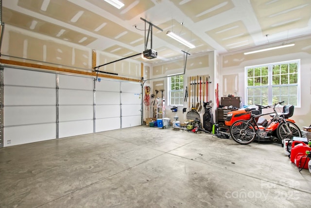 garage featuring a garage door opener