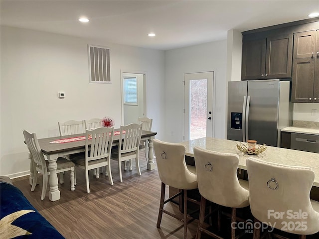 dining room featuring dark hardwood / wood-style flooring