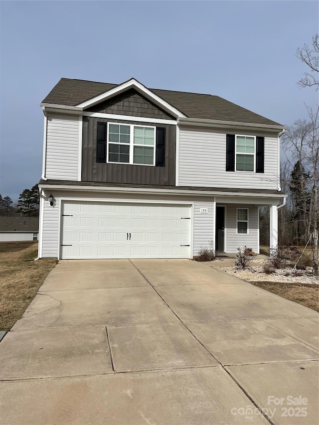 view of front of property with a garage