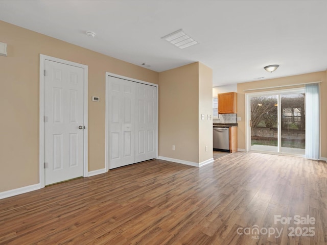 unfurnished living room featuring light hardwood / wood-style flooring