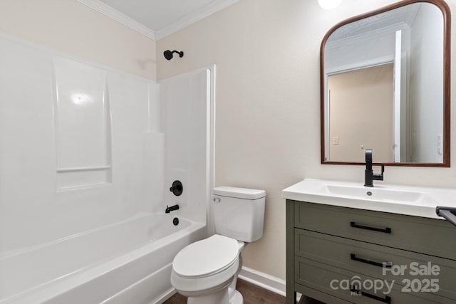 full bathroom with vanity, bathtub / shower combination, crown molding, and toilet