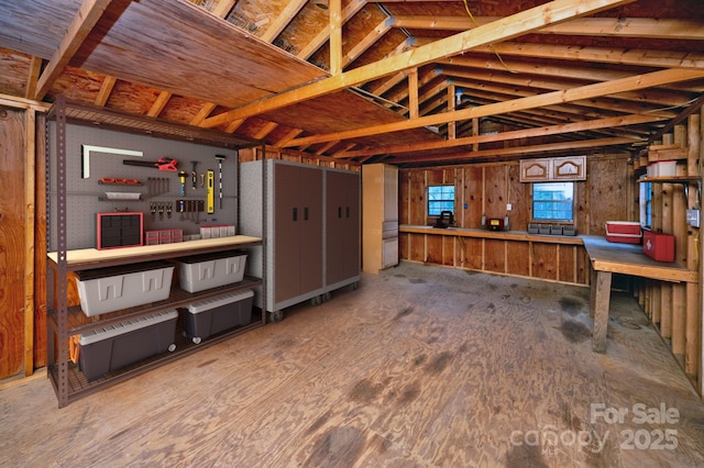 misc room featuring lofted ceiling