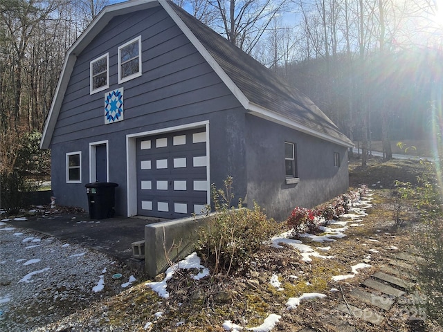 view of home's exterior featuring a garage