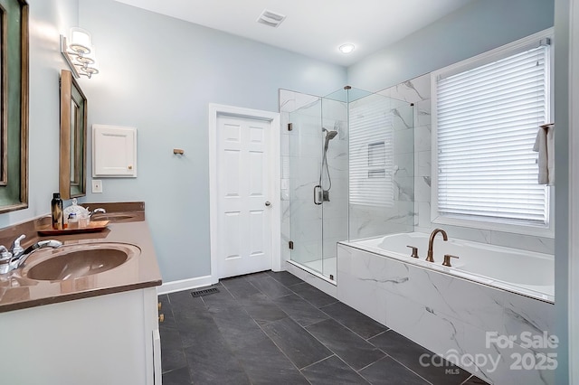 bathroom with vanity, shower with separate bathtub, and tile patterned flooring