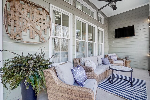 view of patio / terrace featuring an outdoor living space and ceiling fan