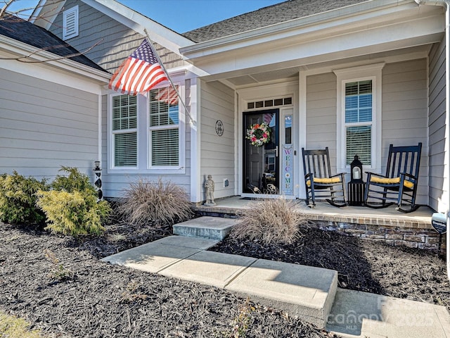 entrance to property with a porch