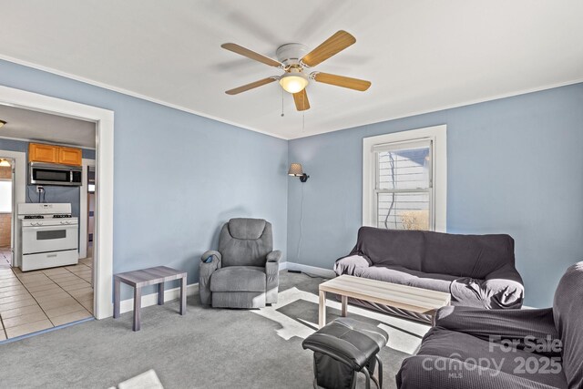 living room featuring light colored carpet and ceiling fan