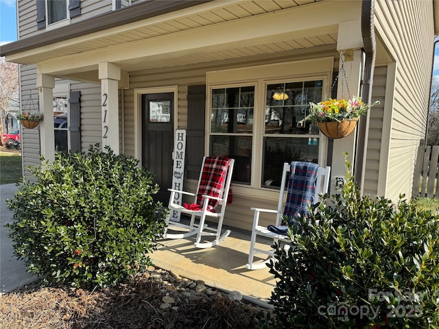 property entrance featuring covered porch