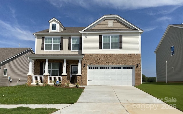 craftsman-style house with a porch, a garage, and a front yard