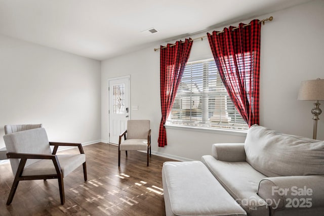 sitting room featuring hardwood / wood-style flooring