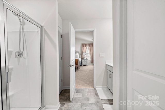 bathroom with vanity and walk in shower