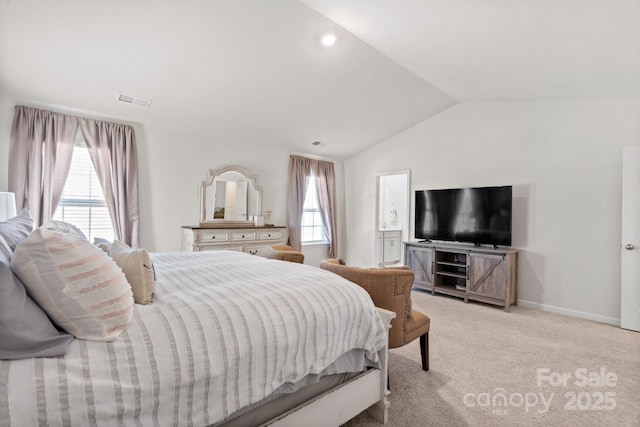 bedroom with light carpet, multiple windows, and lofted ceiling