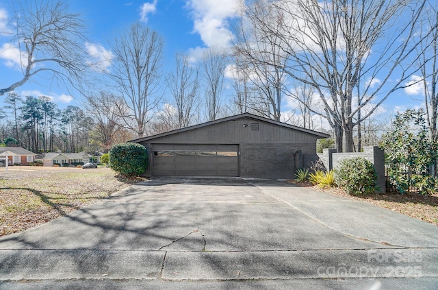 view of side of property featuring a garage