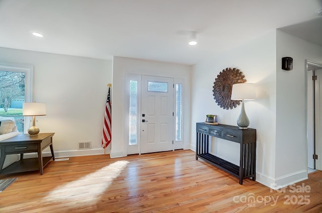 foyer featuring light wood-type flooring