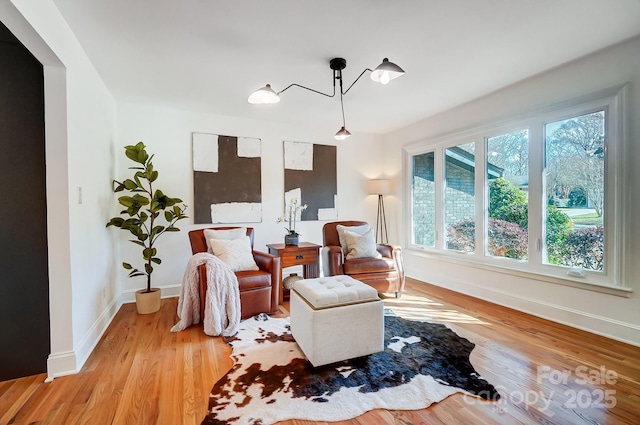 living area featuring light hardwood / wood-style floors