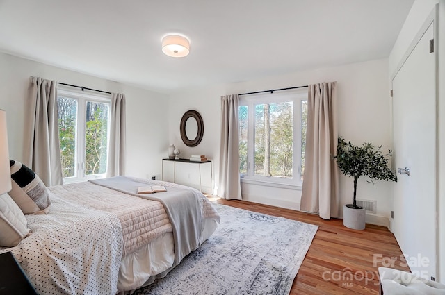 bedroom featuring light hardwood / wood-style floors