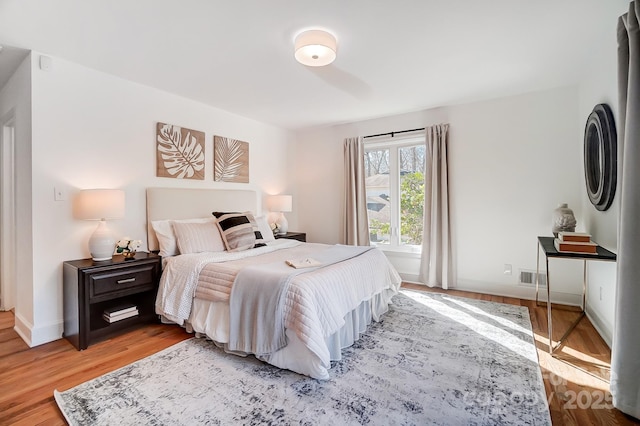 bedroom featuring light hardwood / wood-style floors