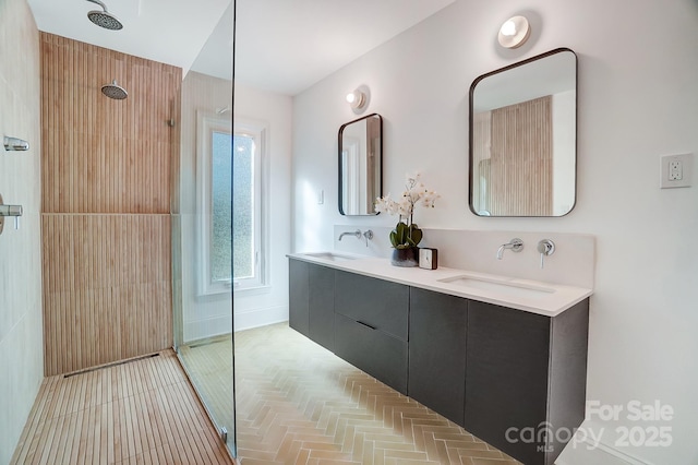 bathroom with vanity and walk in shower