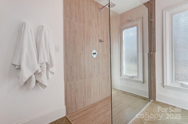 bathroom featuring tiled shower