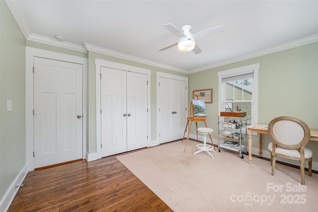 living area with ceiling fan, ornamental molding, and dark hardwood / wood-style flooring