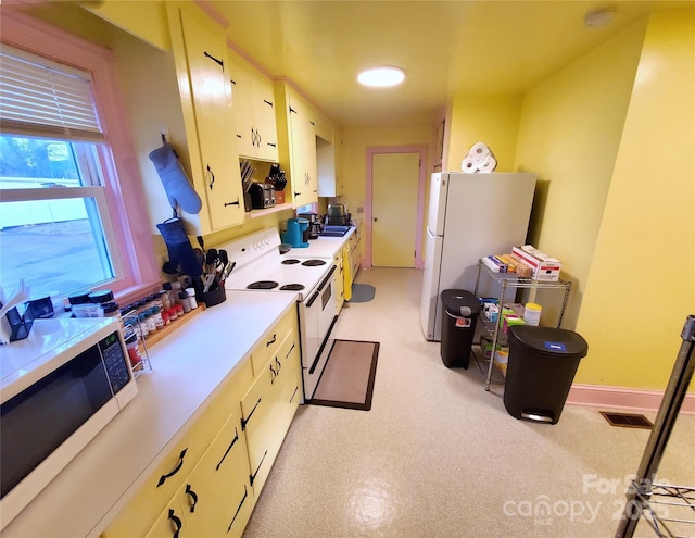 kitchen featuring white appliances