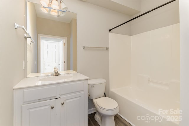 full bathroom featuring toilet, a notable chandelier, shower / bath combination, and vanity
