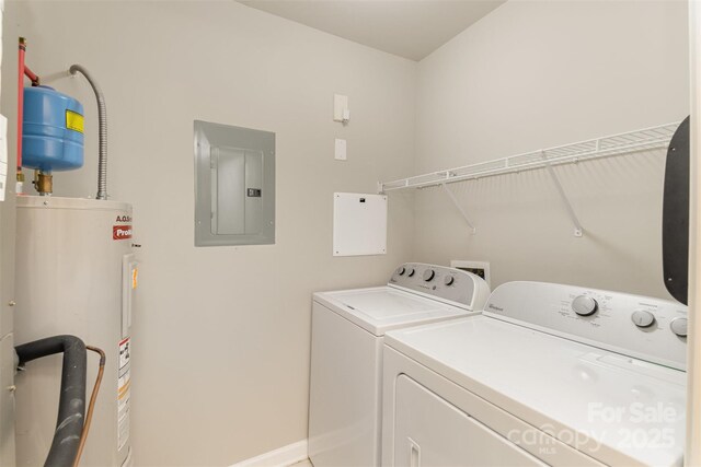 laundry area with water heater, baseboards, electric panel, independent washer and dryer, and laundry area