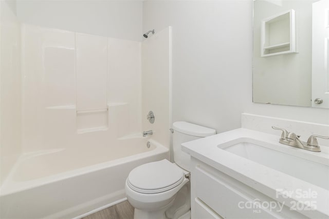 full bathroom featuring vanity, toilet, and shower / bath combination