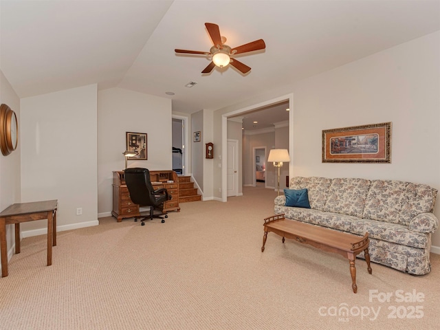 carpeted living room with ceiling fan and lofted ceiling