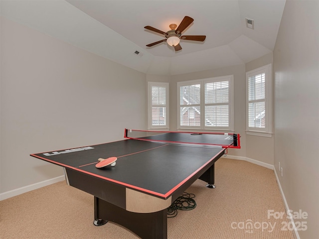 game room featuring lofted ceiling, light colored carpet, and ceiling fan